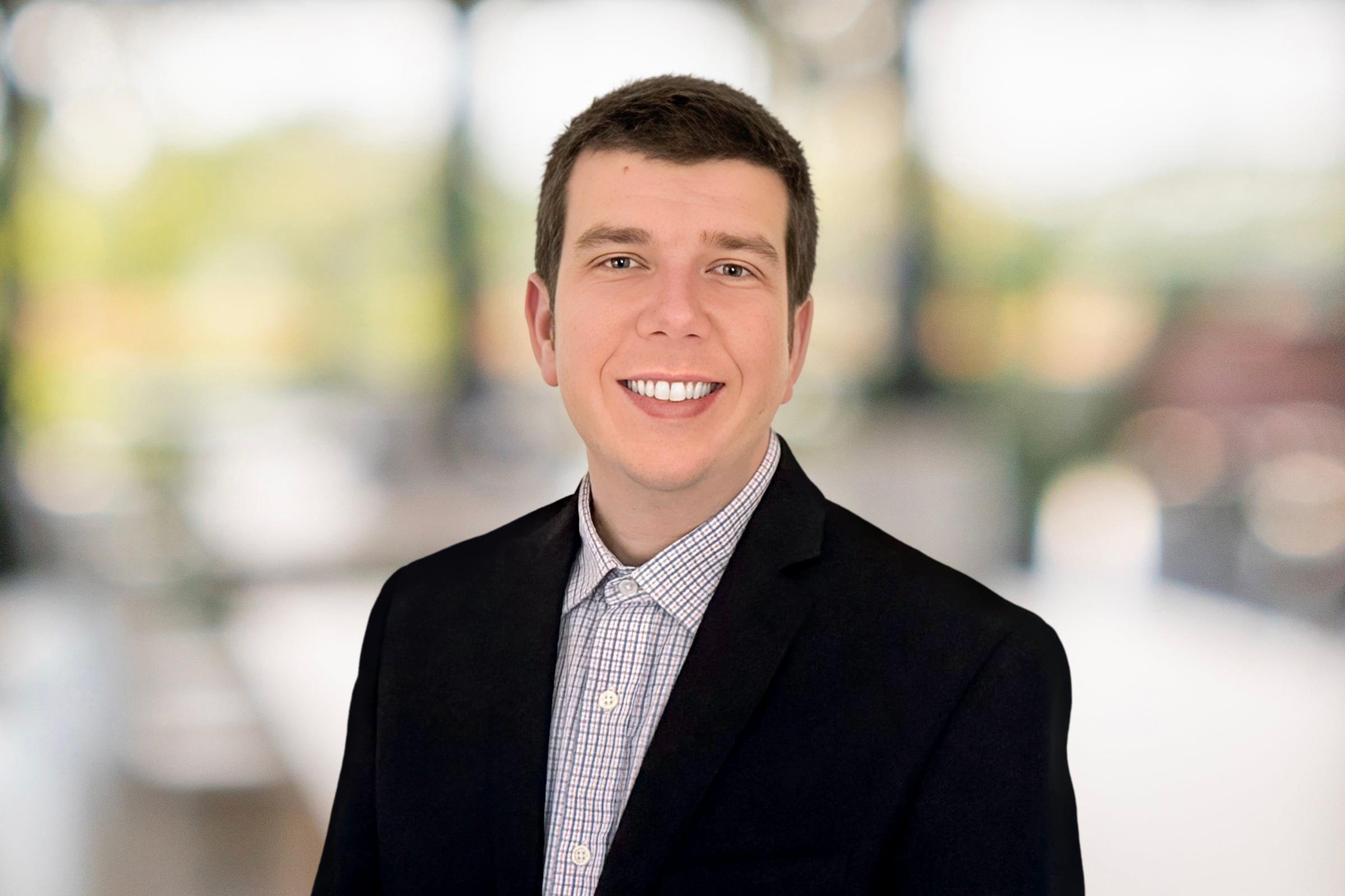 GBQ Promotes Ethan Lane to Director, Financial Services